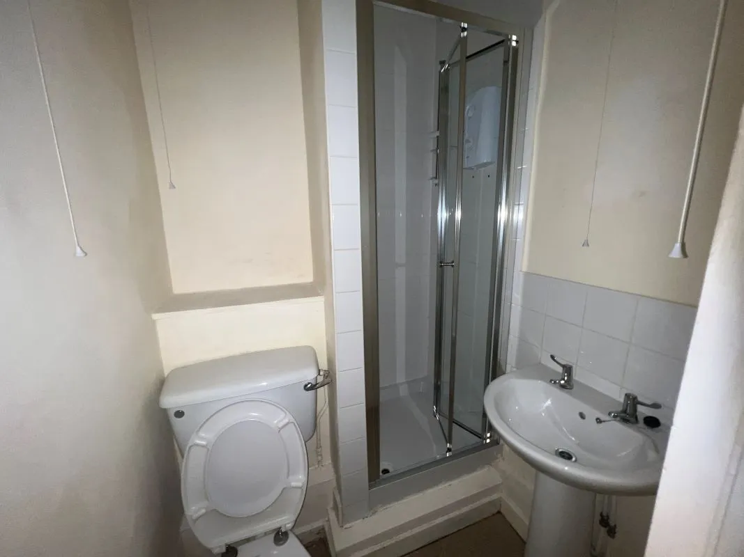 A vacant freehold three storey row of three terraced properties in Balsall Heath 