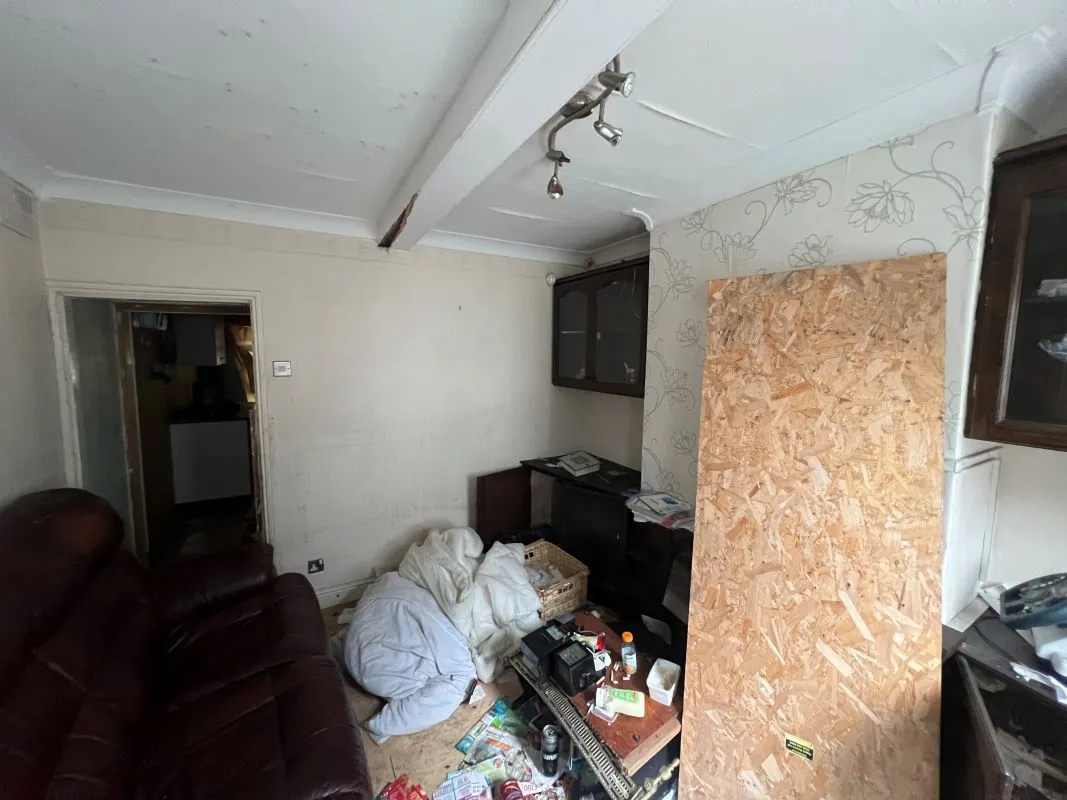 A vacant freehold three bedroom mid terraced property