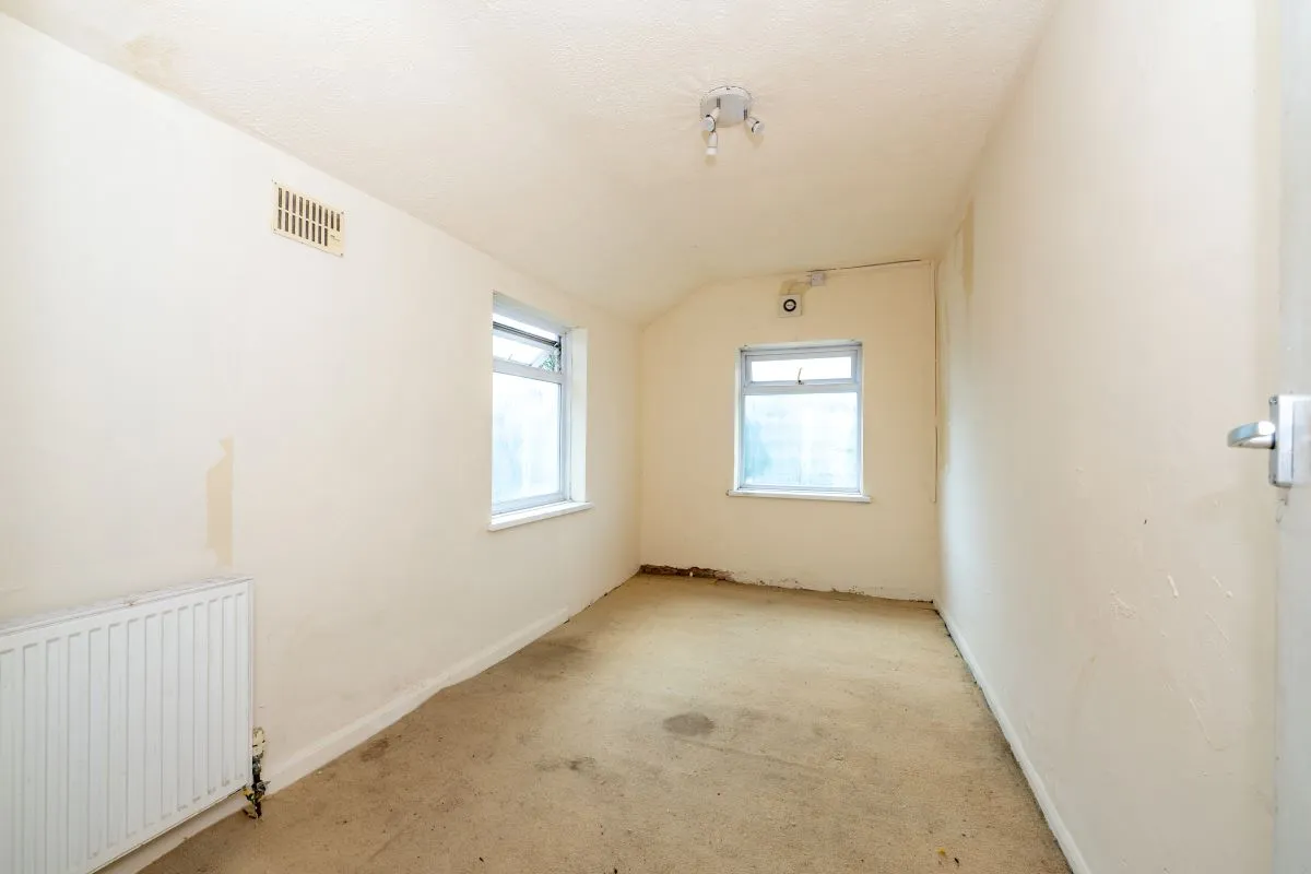A 3 bedroom mid terraced property