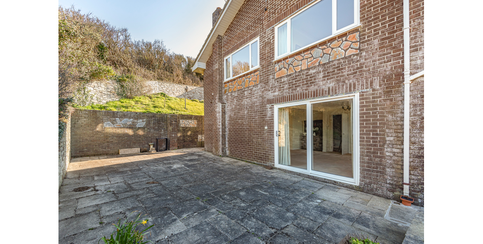 Detached Coastal Home In Need of Renovation