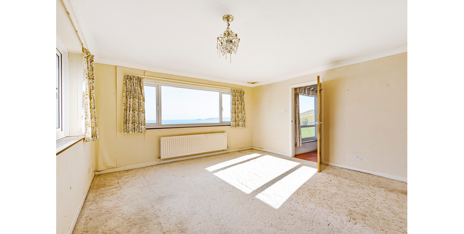 Detached Coastal Home In Need of Renovation
