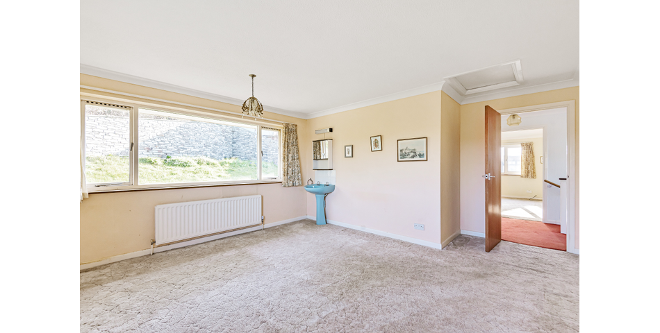 Detached Coastal Home In Need of Renovation
