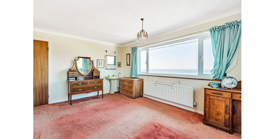 Detached Coastal Home In Need of Renovation