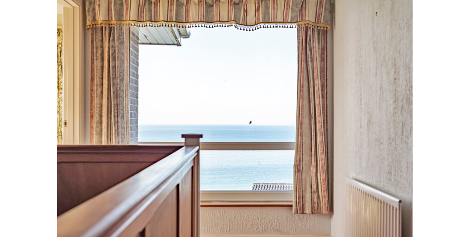Detached Coastal Home In Need of Renovation