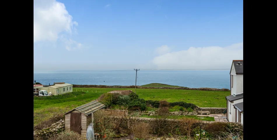 RENOVATION PROJECT SET WITHIN A DESIRABLE VILLAGE SETTING!
