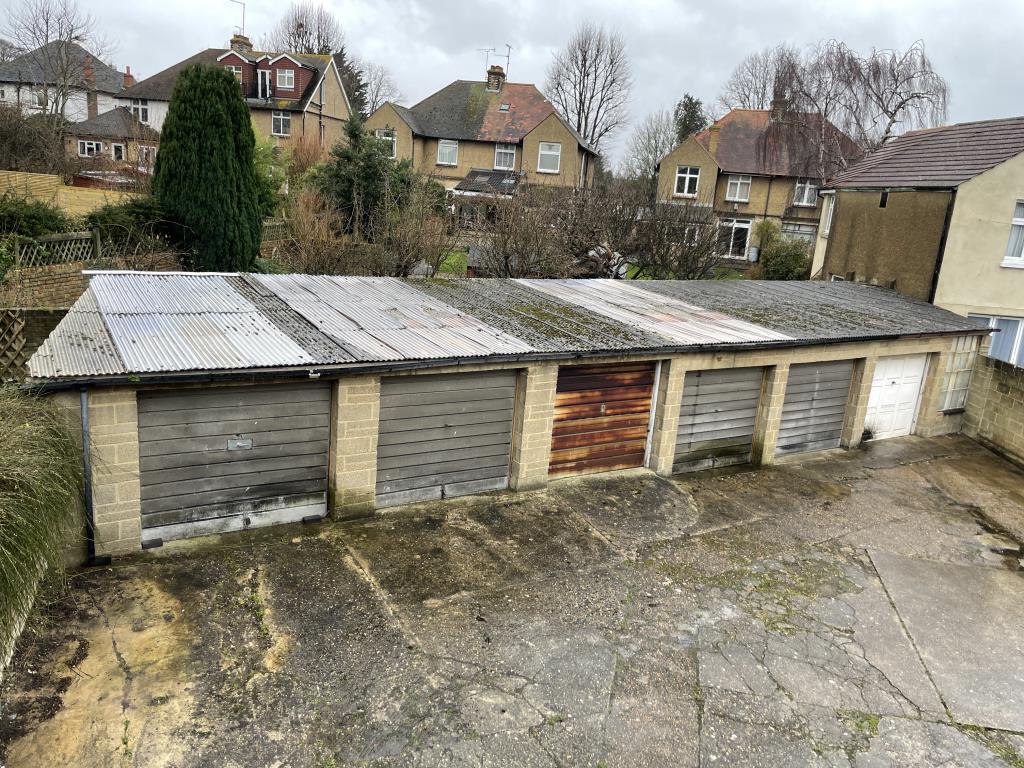 Freehold Property Arranged As Four Flats With Further Conversion For Completion And Six Garages
