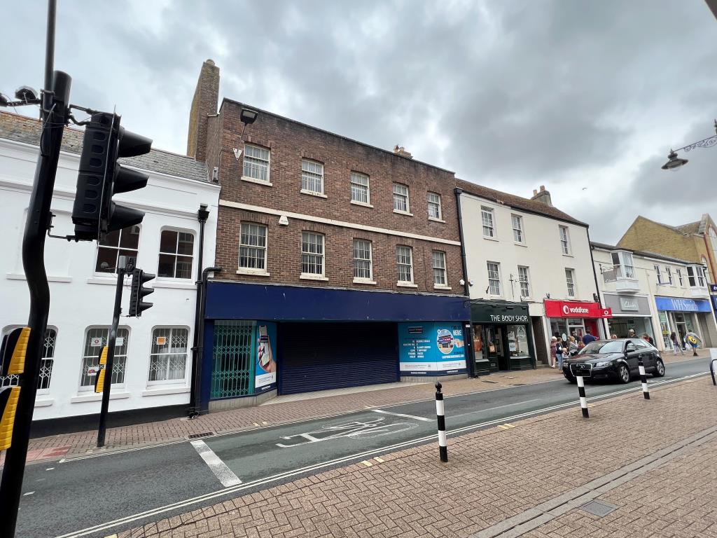 Freehold Town Centre Shop And Upper Parts With Planning For Conversion