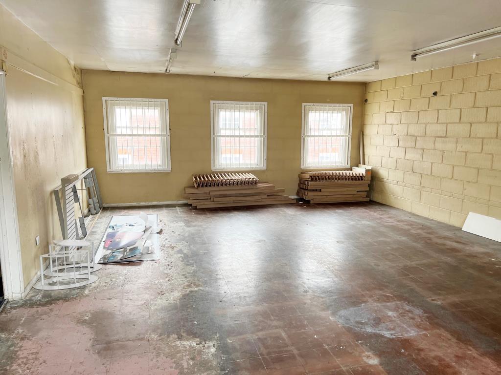 Freehold Town Centre Shop And Upper Parts With Planning For Conversion