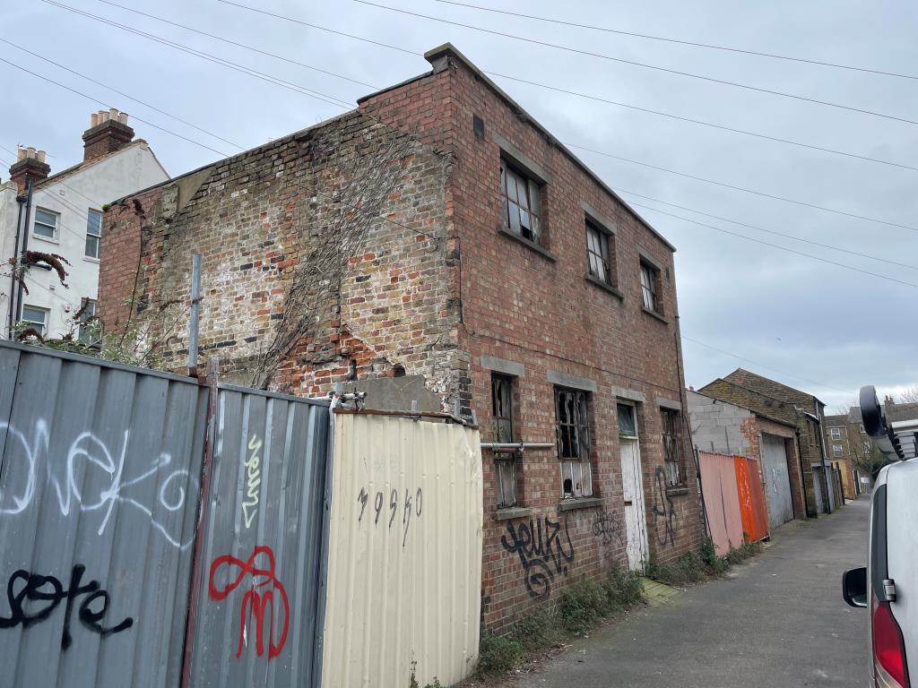 Site With Planning For Five Houses In Town Centre