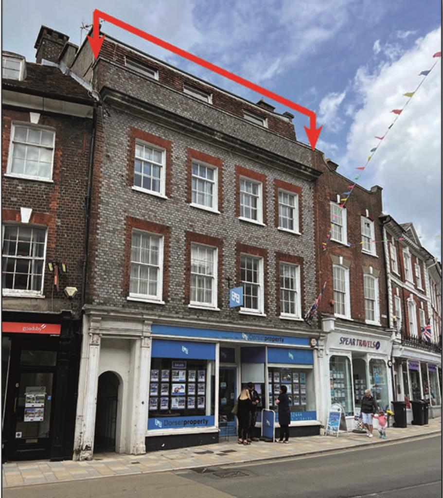 Pair Of Freehold Town Centre Buildings Comprising Five Flats And Two Shops