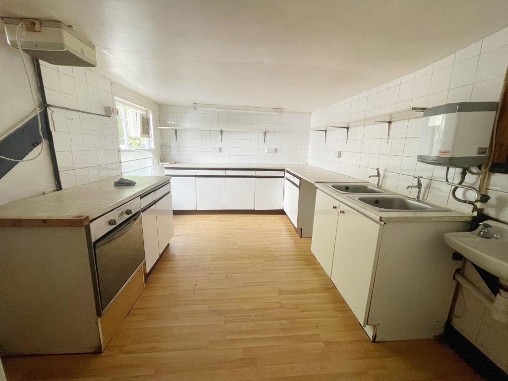 Commercial Property With Upper Parts In Town Centre