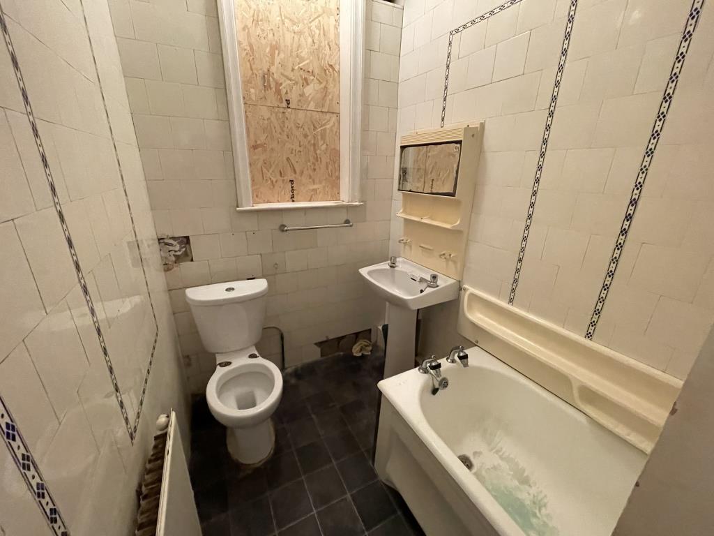 Semi-Detached Bungalow With Garage For Improvement
