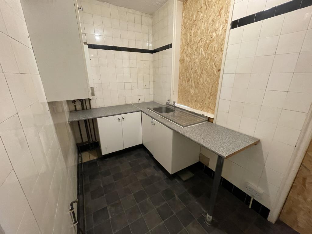 Semi-Detached Bungalow With Garage For Improvement