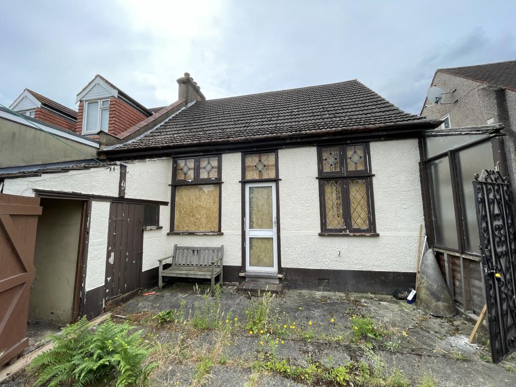 Semi-Detached Bungalow With Garage For Improvement