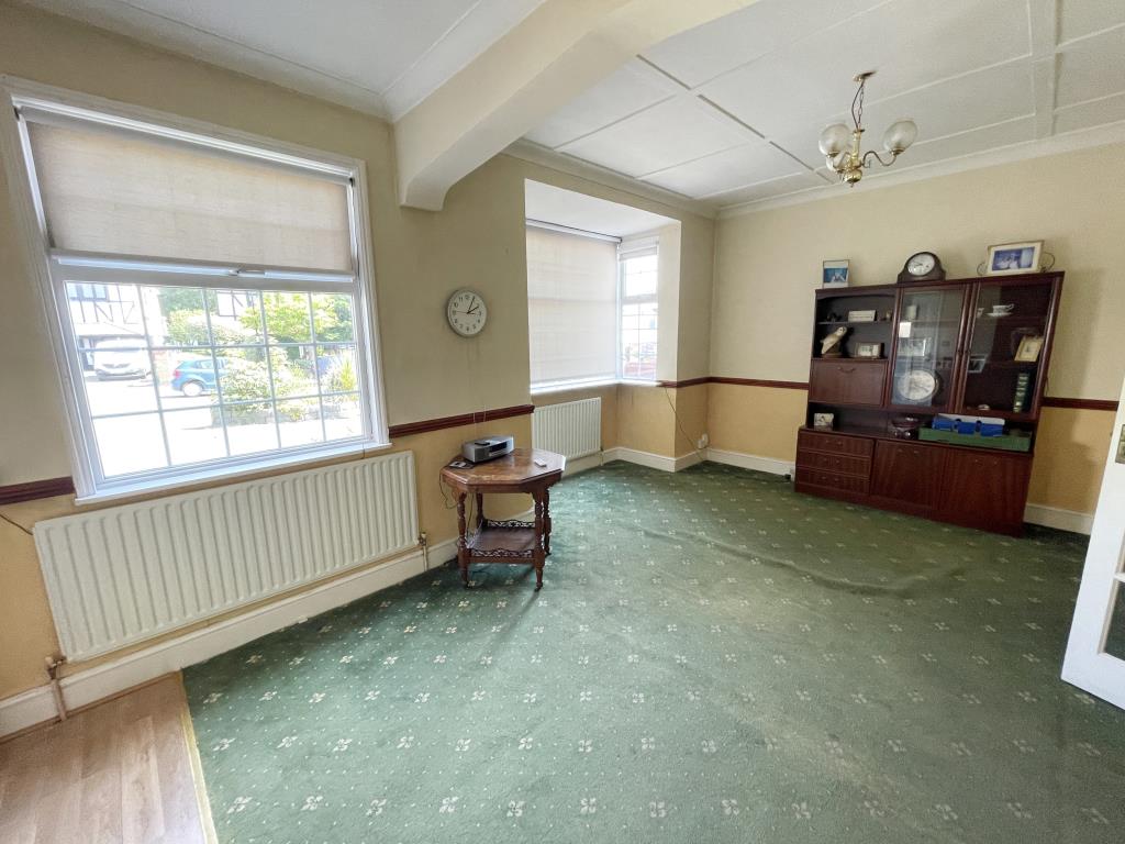Detached Bungalow & Garage With Potential