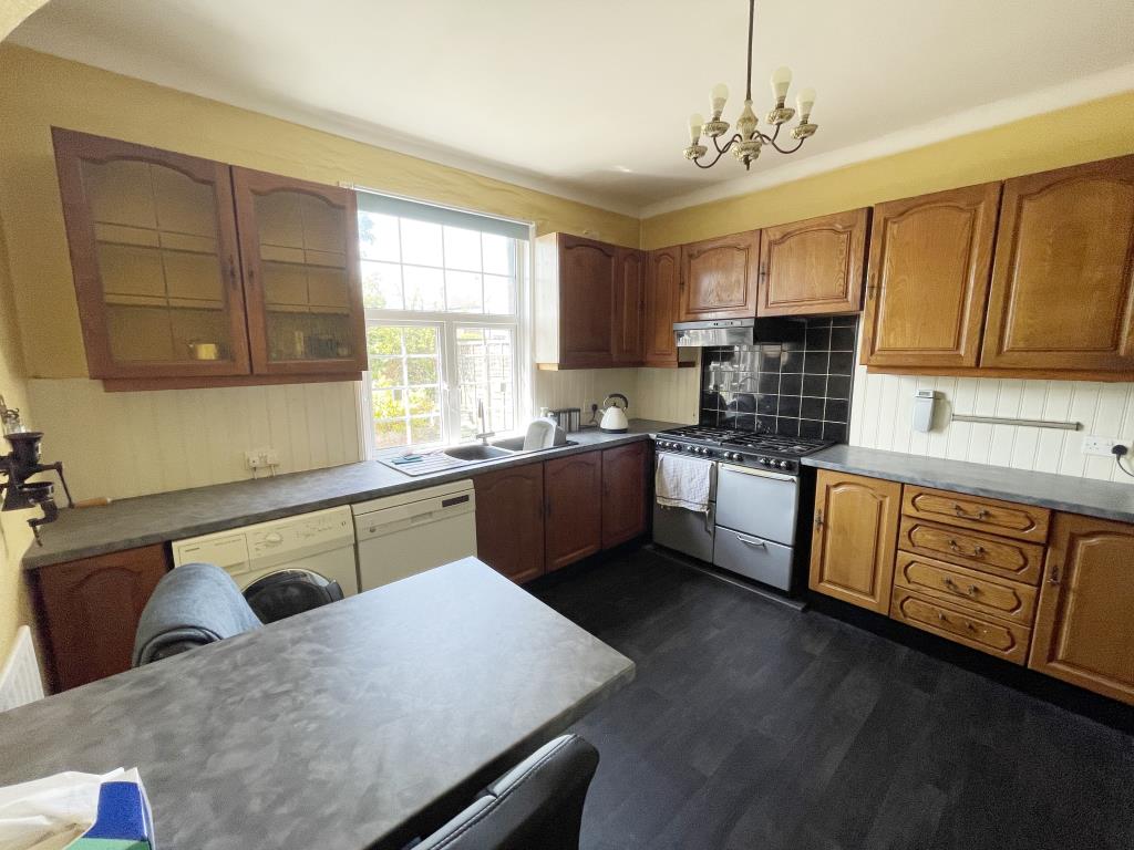 Detached Bungalow & Garage With Potential