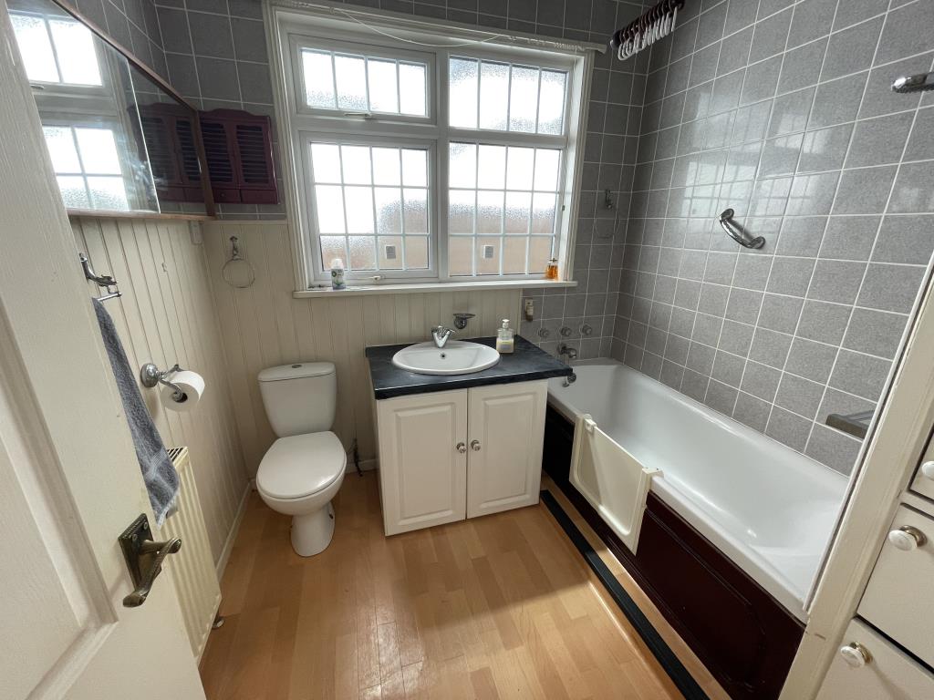 Detached Bungalow & Garage With Potential