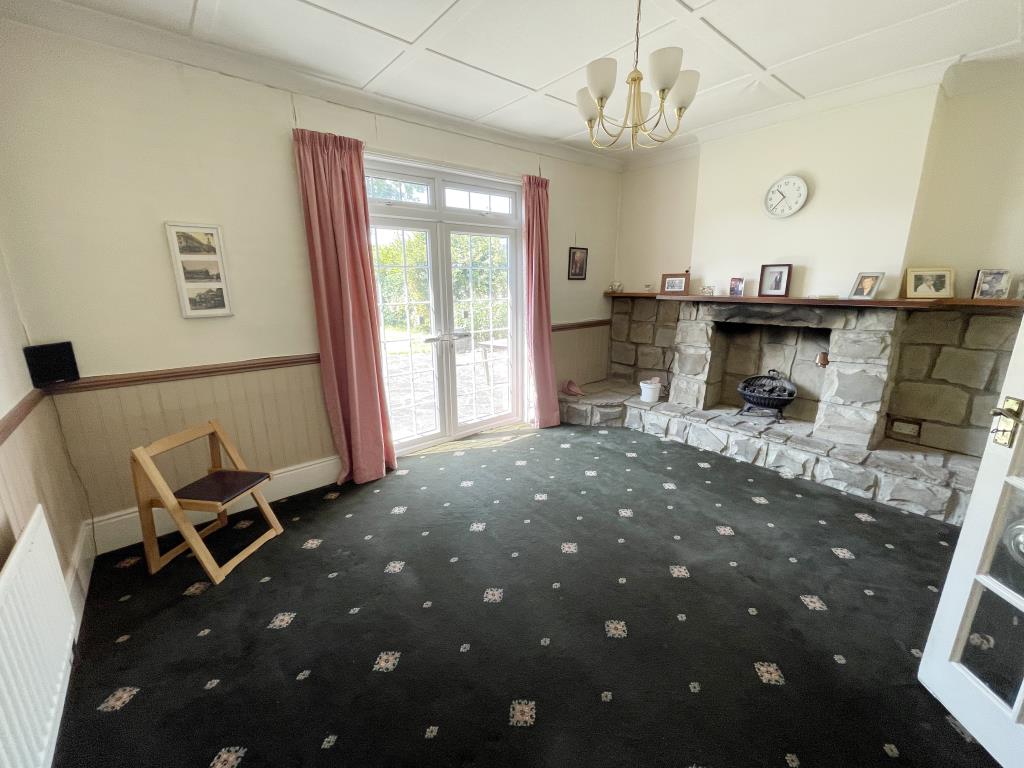 Detached Bungalow & Garage With Potential