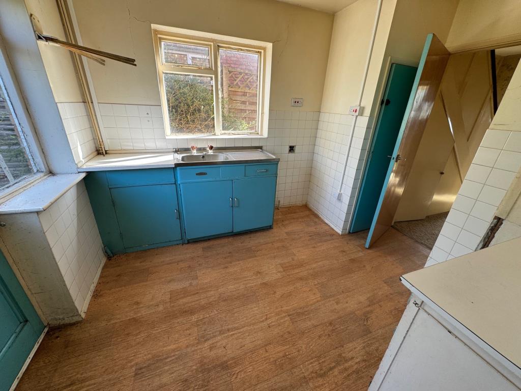 Three-Bedroom House For Improvement With Garage En-Bloc