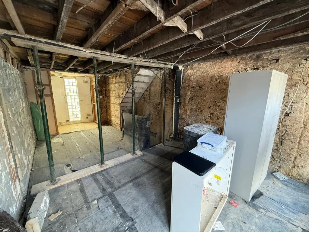 Mixed Use Building For Improvement And Repair