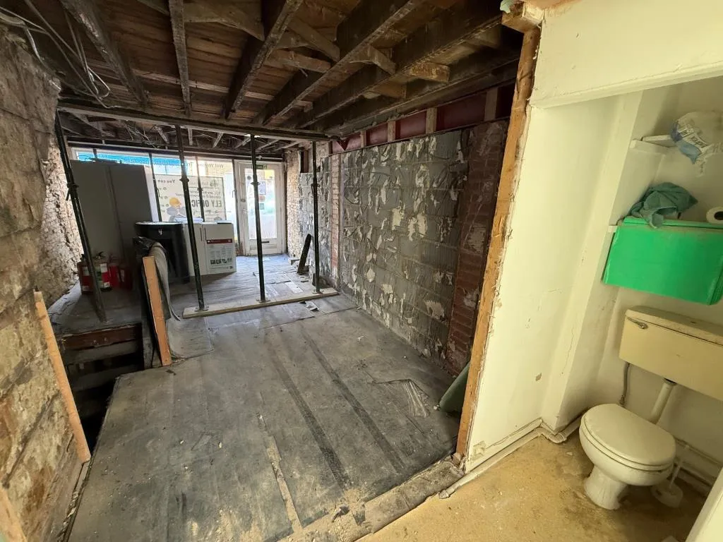 Mixed Use Building For Improvement And Repair