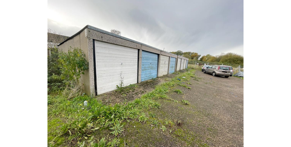 Lot 119 - Freehold Land & Six Lock-up Garages