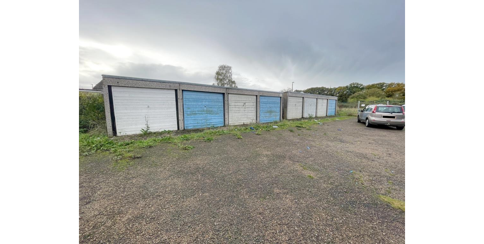 Lot 119 - Freehold Land & Six Lock-up Garages