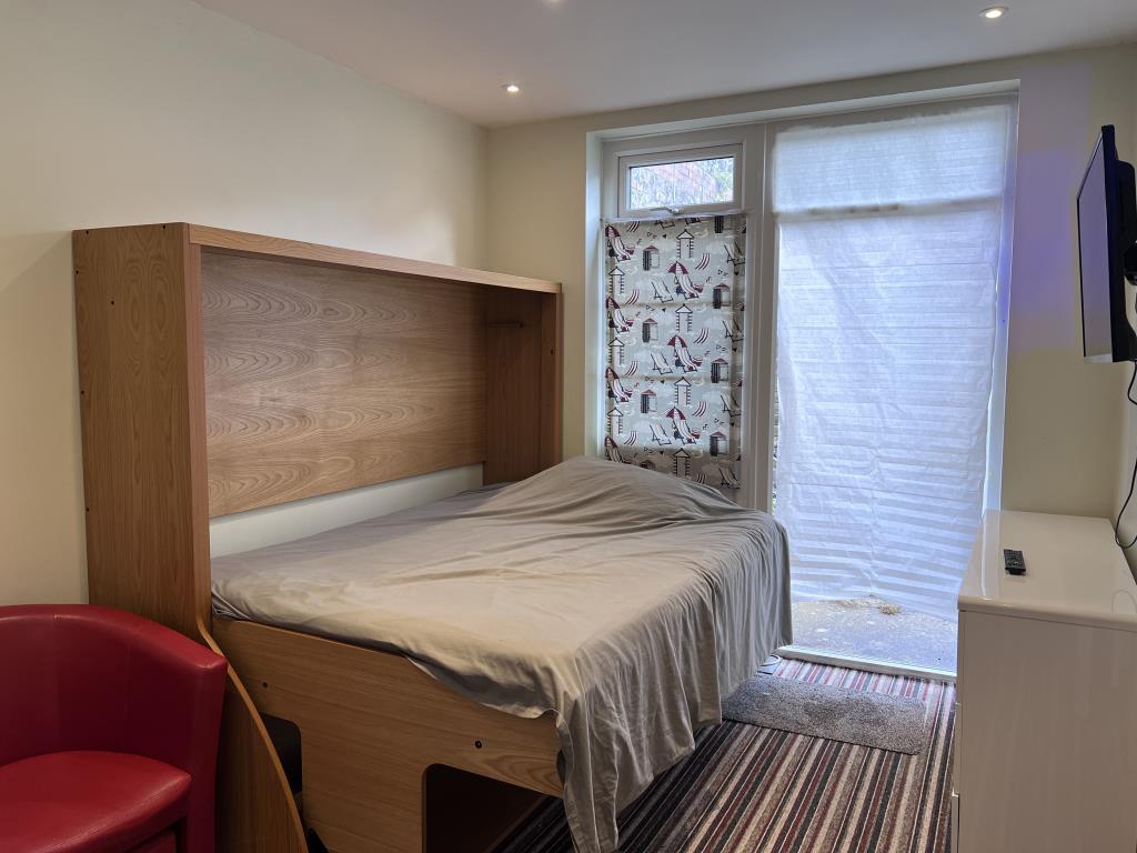 Six-Bedroom Guest House