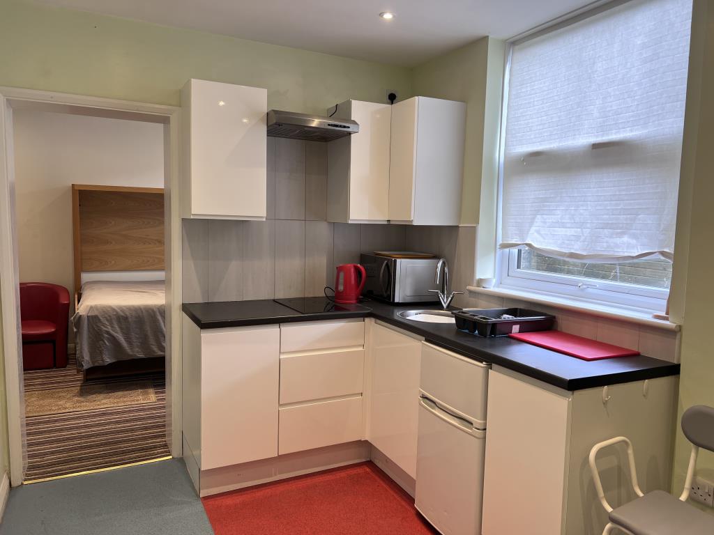 Six-Bedroom Guest House