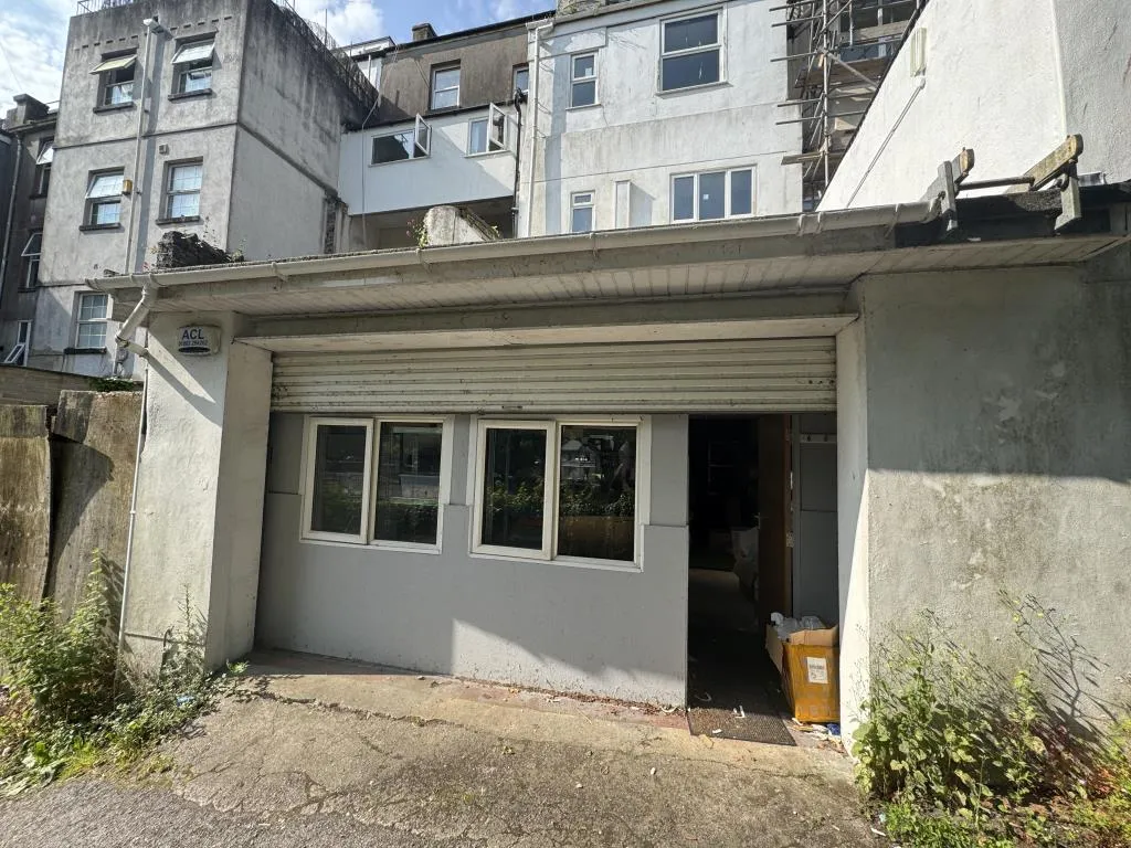 Vacant Commercial Unit Arranged Over Three Floors And Separate Workshop Unit
