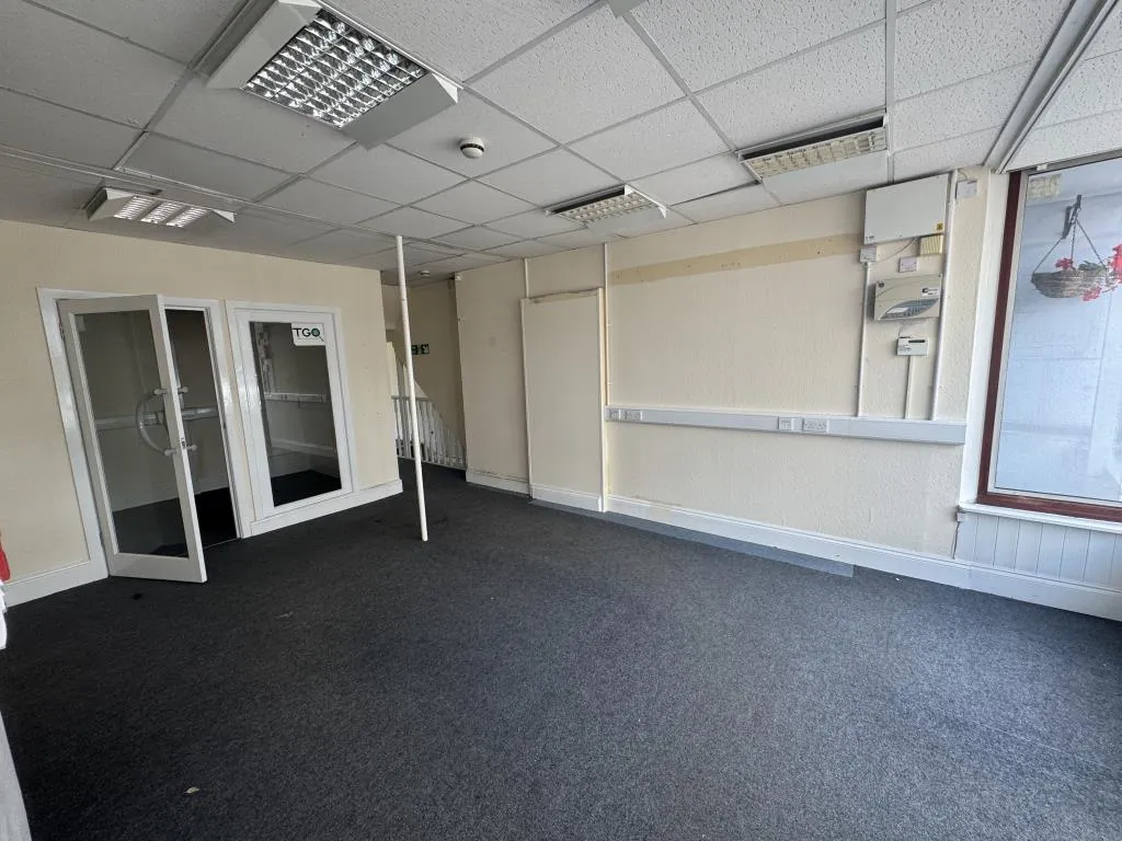 Vacant Commercial Unit Arranged Over Three Floors And Separate Workshop Unit