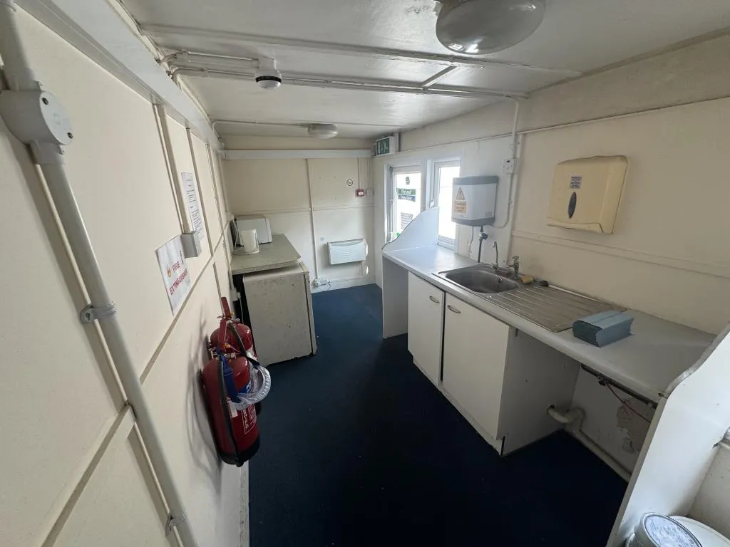 Vacant Commercial Unit Arranged Over Three Floors And Separate Workshop Unit