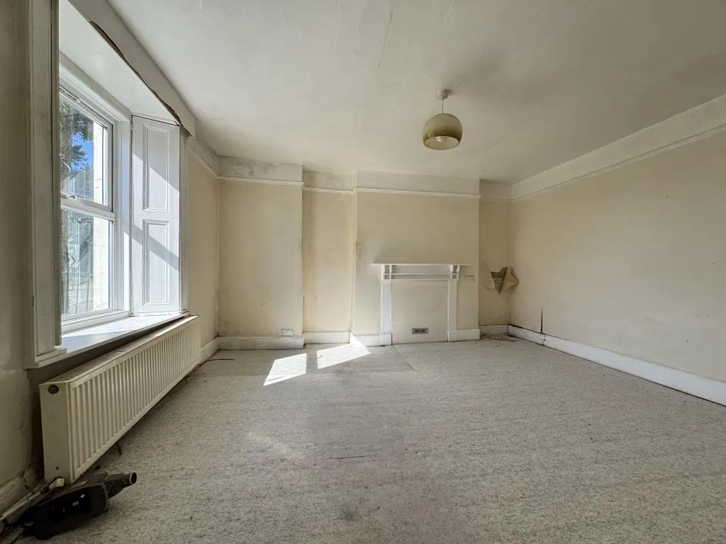 Mid-Terrace Corner House