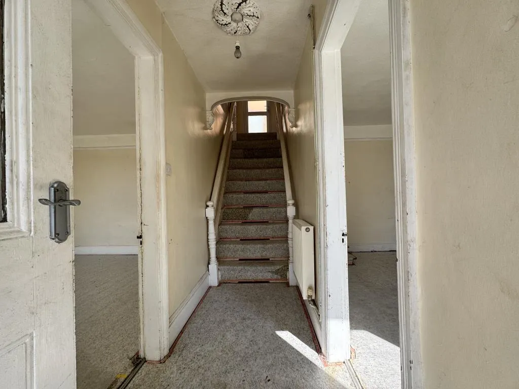 Mid-Terrace Corner House