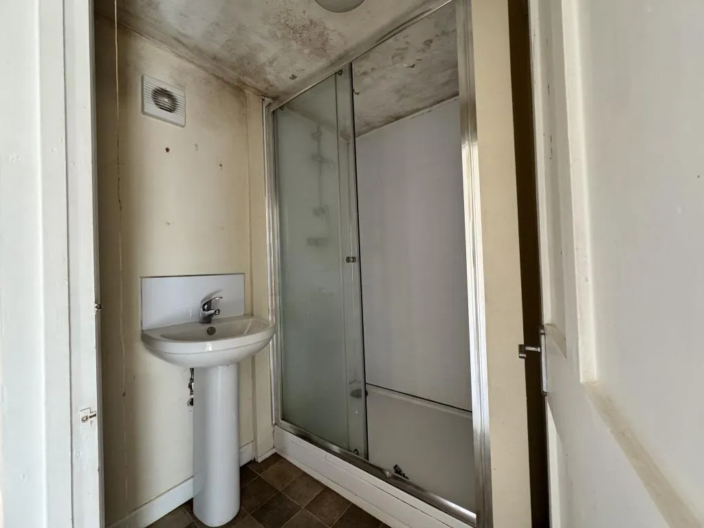 Mid-Terrace Corner House