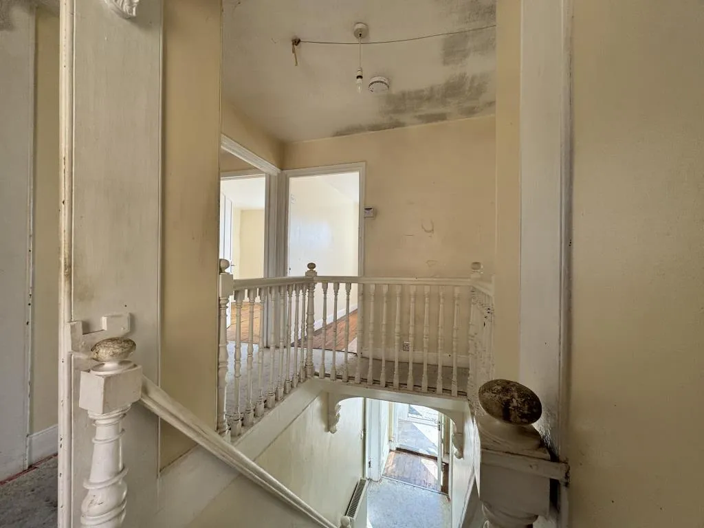 Mid-Terrace Corner House