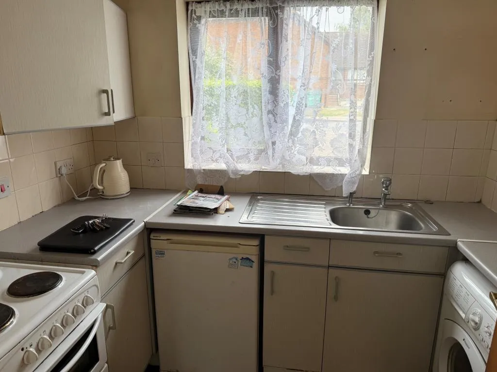 Ground Floor Flat With Parking In Need Of Updating