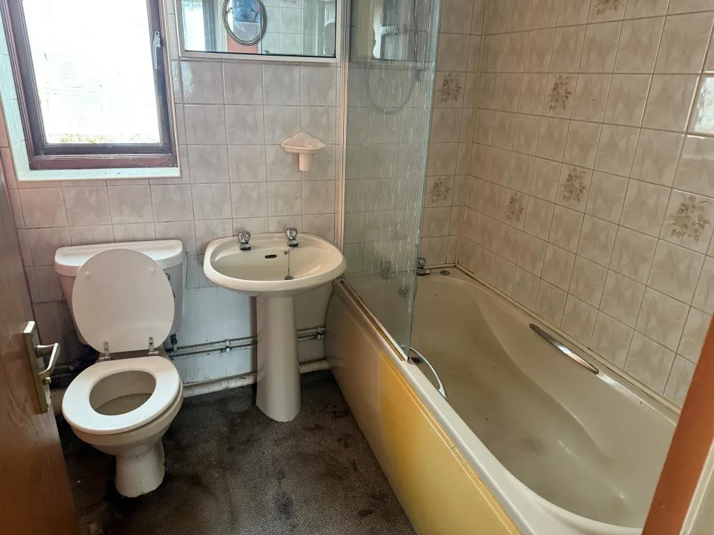 Ground Floor Flat With Parking In Need Of Updating