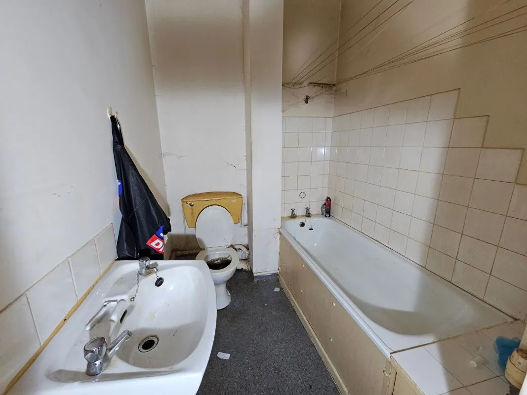 Freehold Vacant Property containing Four Self Contained Flats