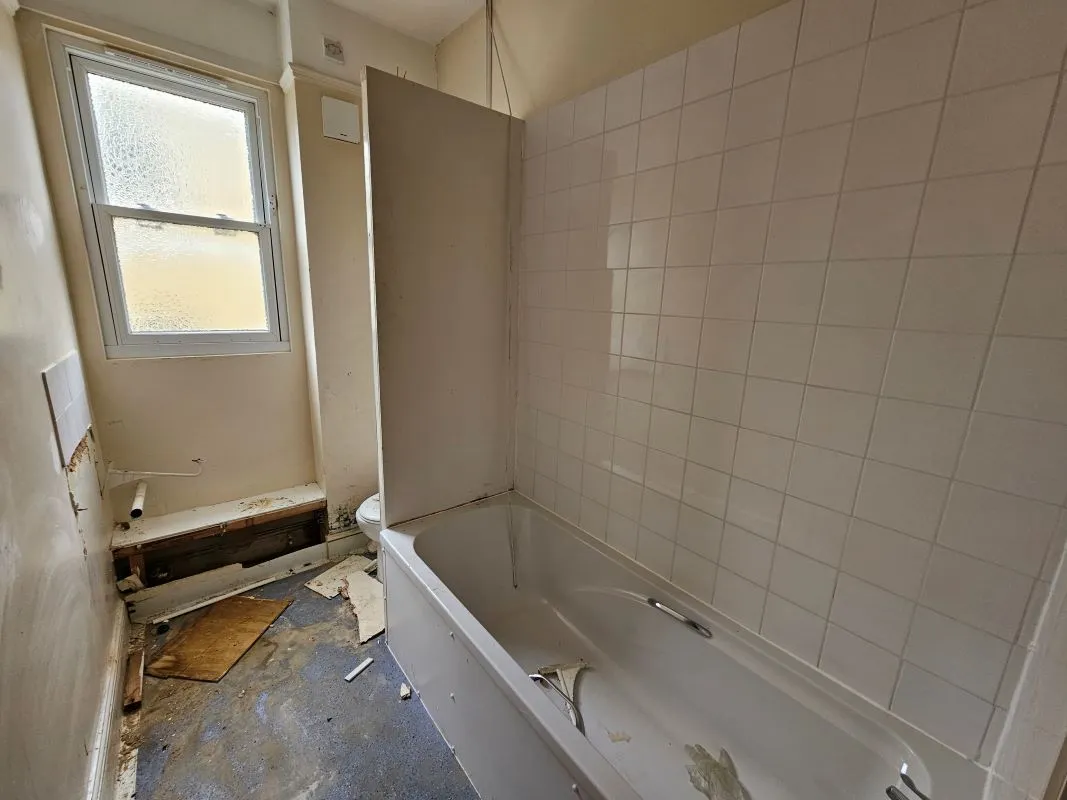 Freehold Vacant Property containing Four Self Contained Flats