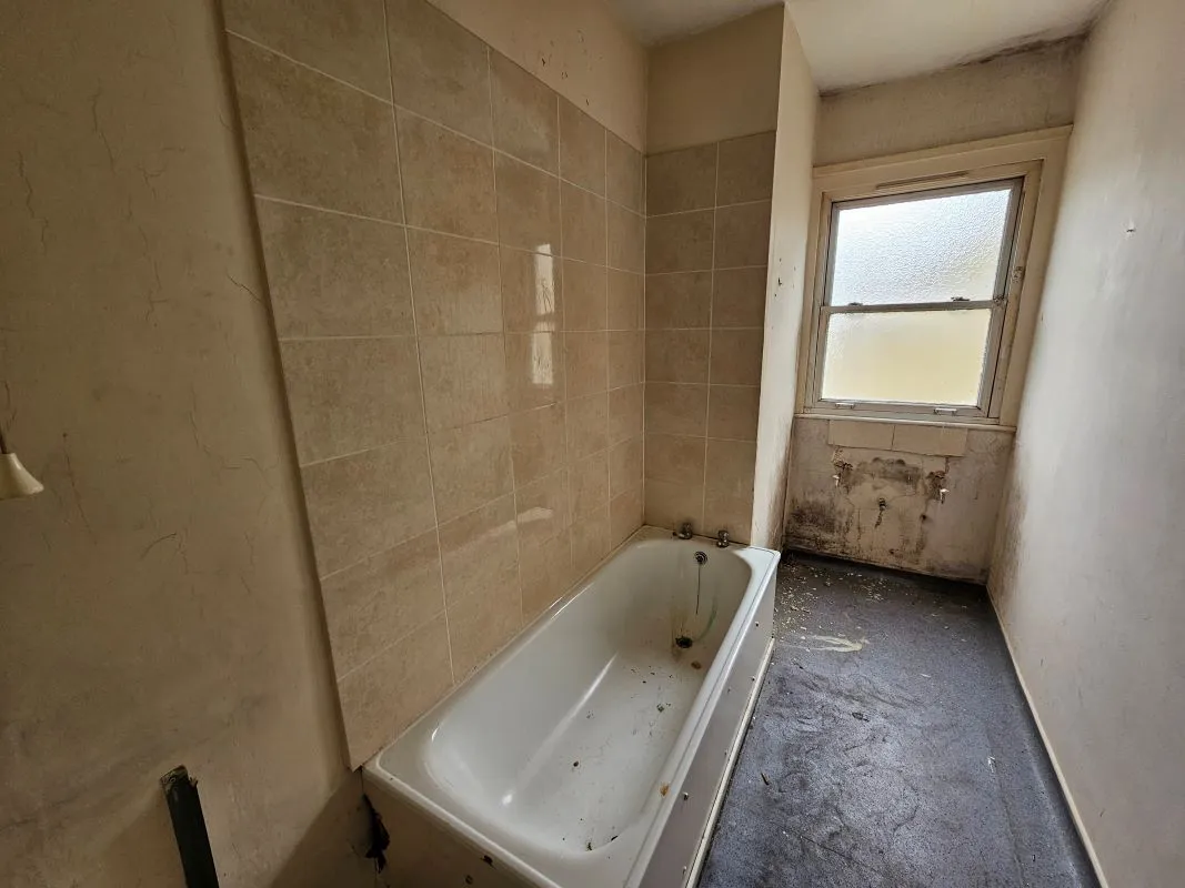 Freehold Vacant Property containing Four Self Contained Flats