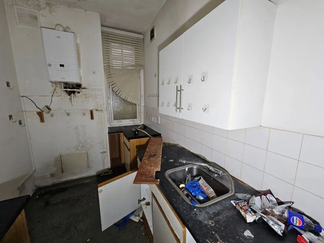 Freehold Vacant Property containing Four Self Contained Flats