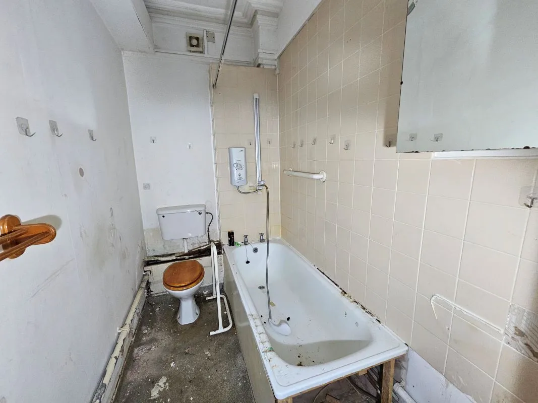 Freehold Vacant Property containing Four Self Contained Flats