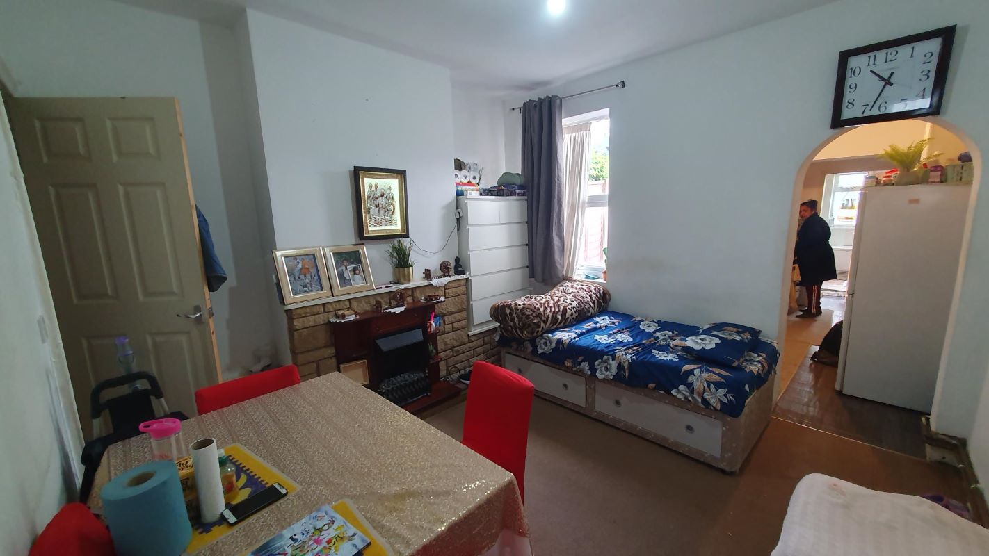 Freehold Investment Three Bedroom Mid-Terraced House