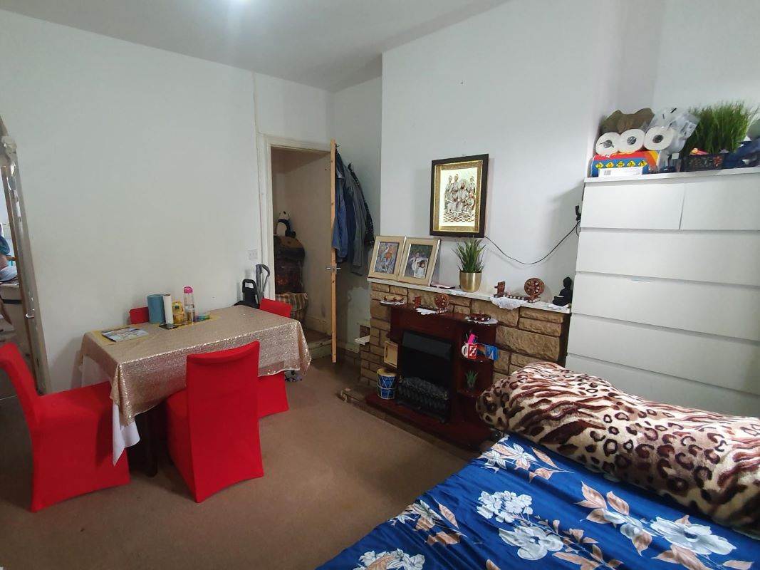 Freehold Investment Three Bedroom Mid-Terraced House