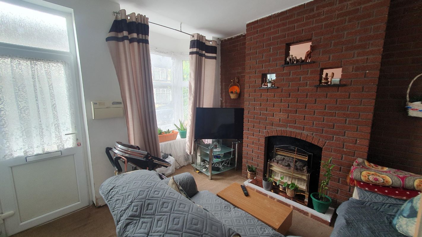Freehold Investment Three Bedroom Mid-Terraced House