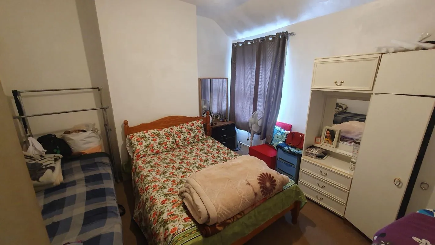 Freehold Investment Three Bedroom Mid-Terraced House