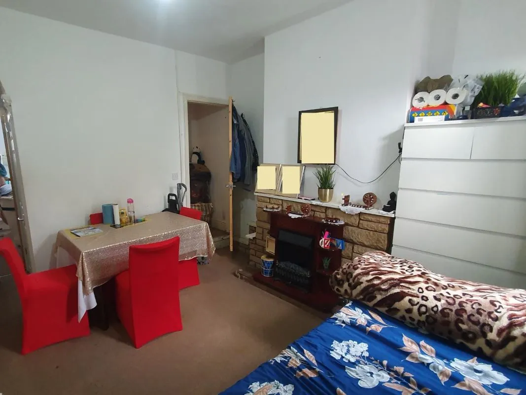 Freehold Investment Three Bedroom Mid-Terraced House