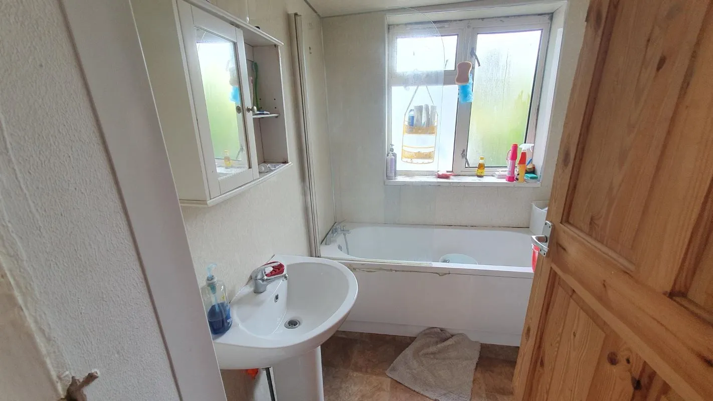 Freehold Investment Three Bedroom Mid-Terraced House