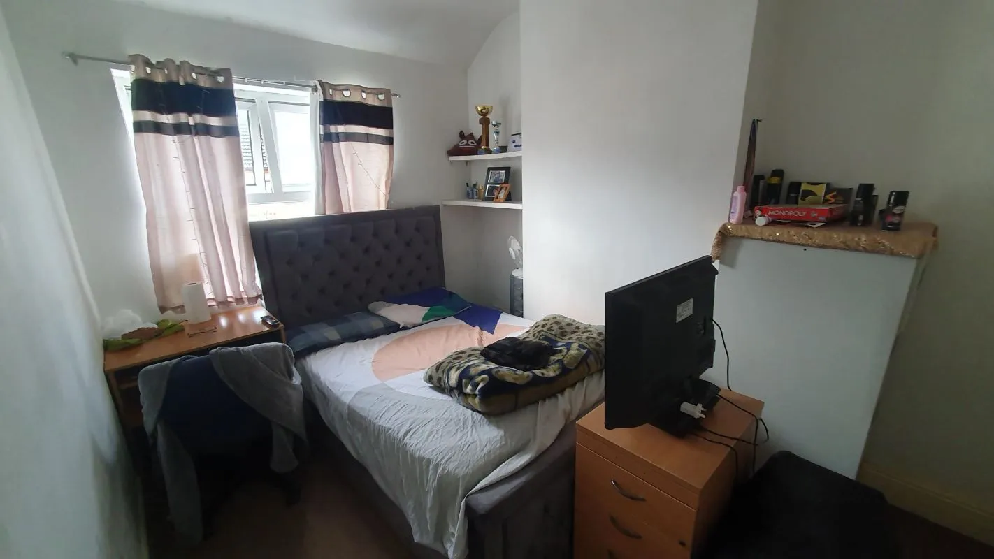 Freehold Investment Three Bedroom Mid-Terraced House